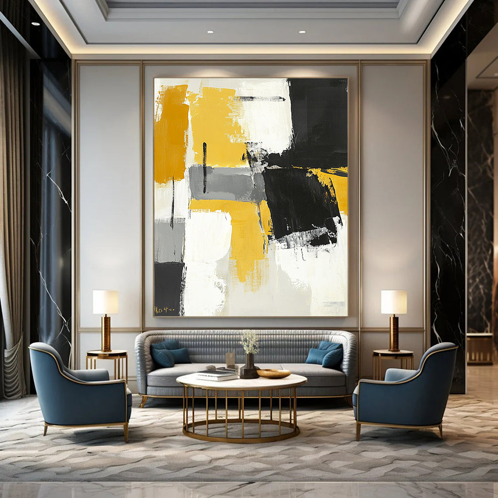 Contemporary hand-painted abstract art featuring black gray and yellow color blocks with brushstrokes on a neutral toned white background. DLZ0731