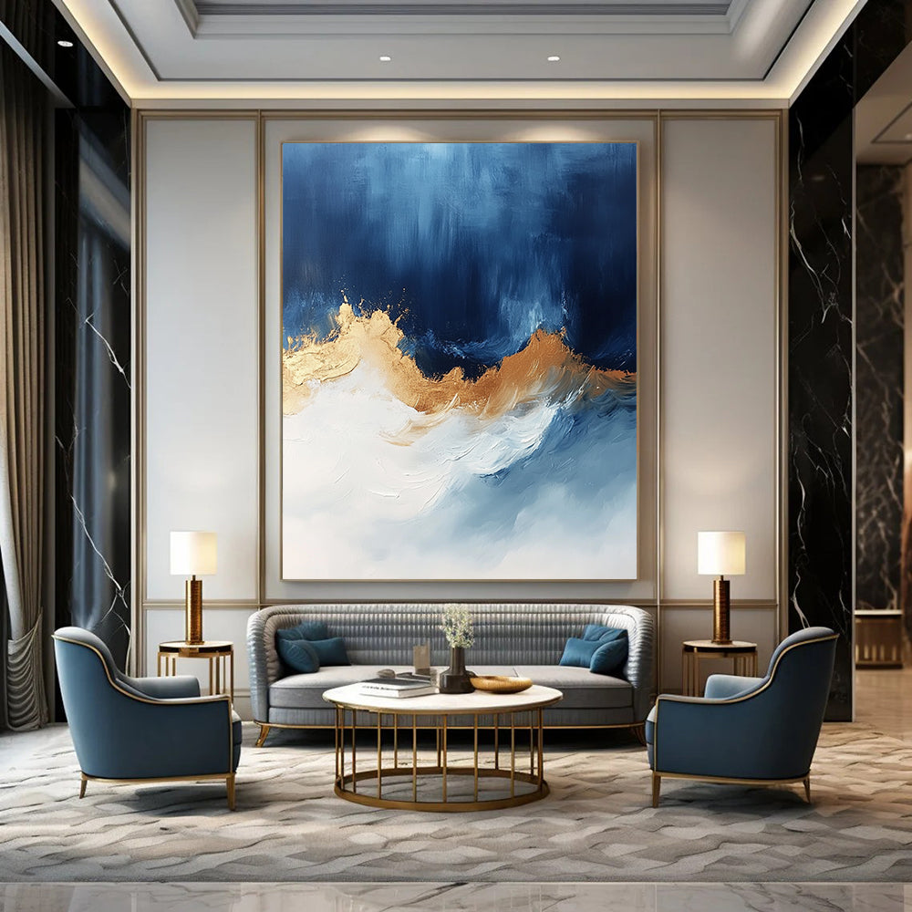 Contemporary abstract art features bold blue white and gold hues with sweeping brushstrokes energizing the canvas creating depth and visual allure. DLZ0335