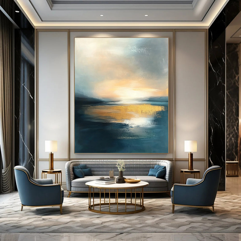 Contemporary abstract painting featuring water and sky at sunset with muted tones and gold accents, perfect for elevating any space. DLZ0494