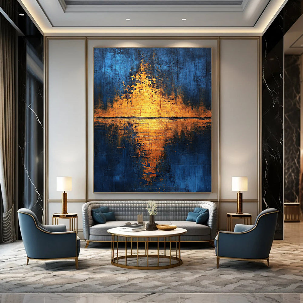 Contemporary hand-painted abstract art featuring golden light reflections on water with blue and gold hues enhanced by gold foil and textured canvas. DLZ0506