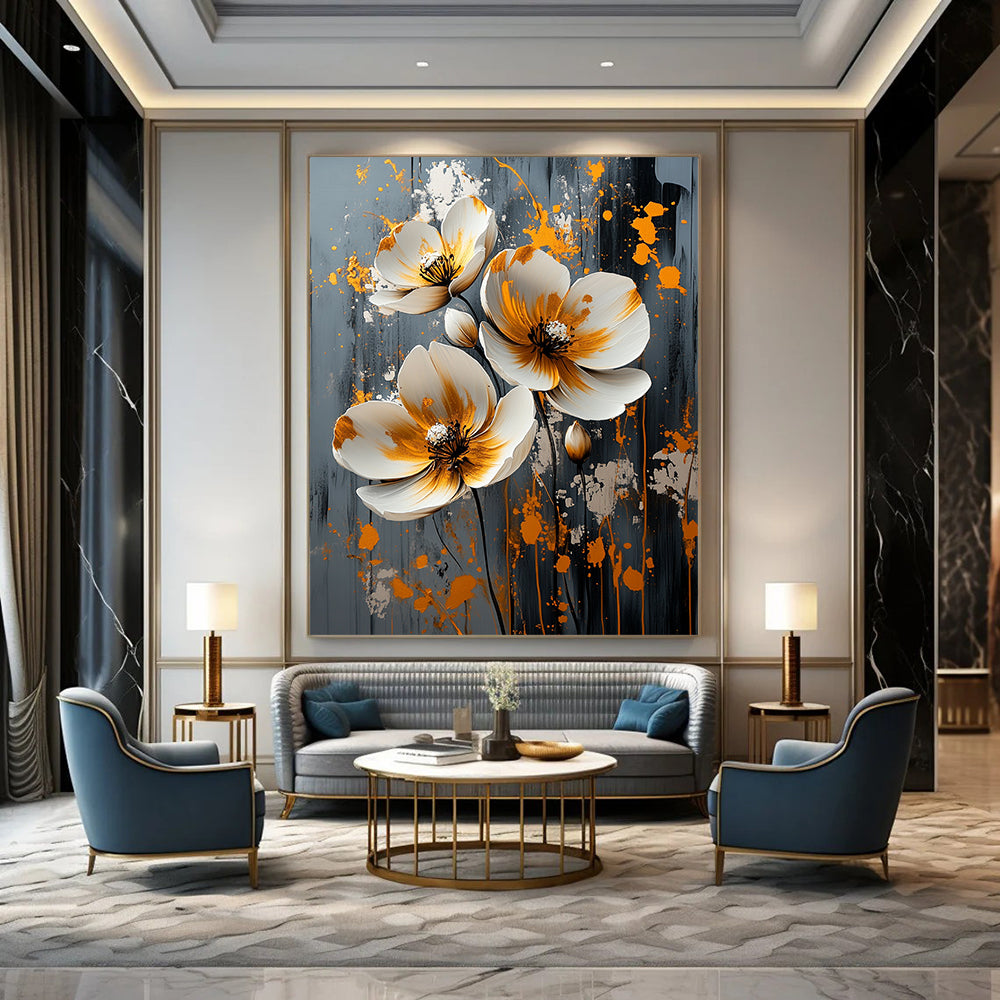 Contemporary abstract artwork features white flowers with gold and silver splashes on a textured grey canvas, perfect for modern decor. DLZ0824