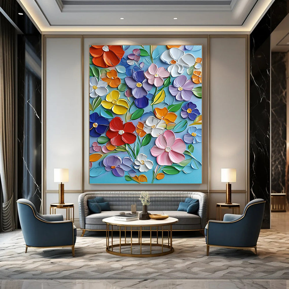 Vibrant contemporary hand-painted abstract artwork featuring blooming flowers in bold colors with textured strokes on a light blue canvas. DLZ1493