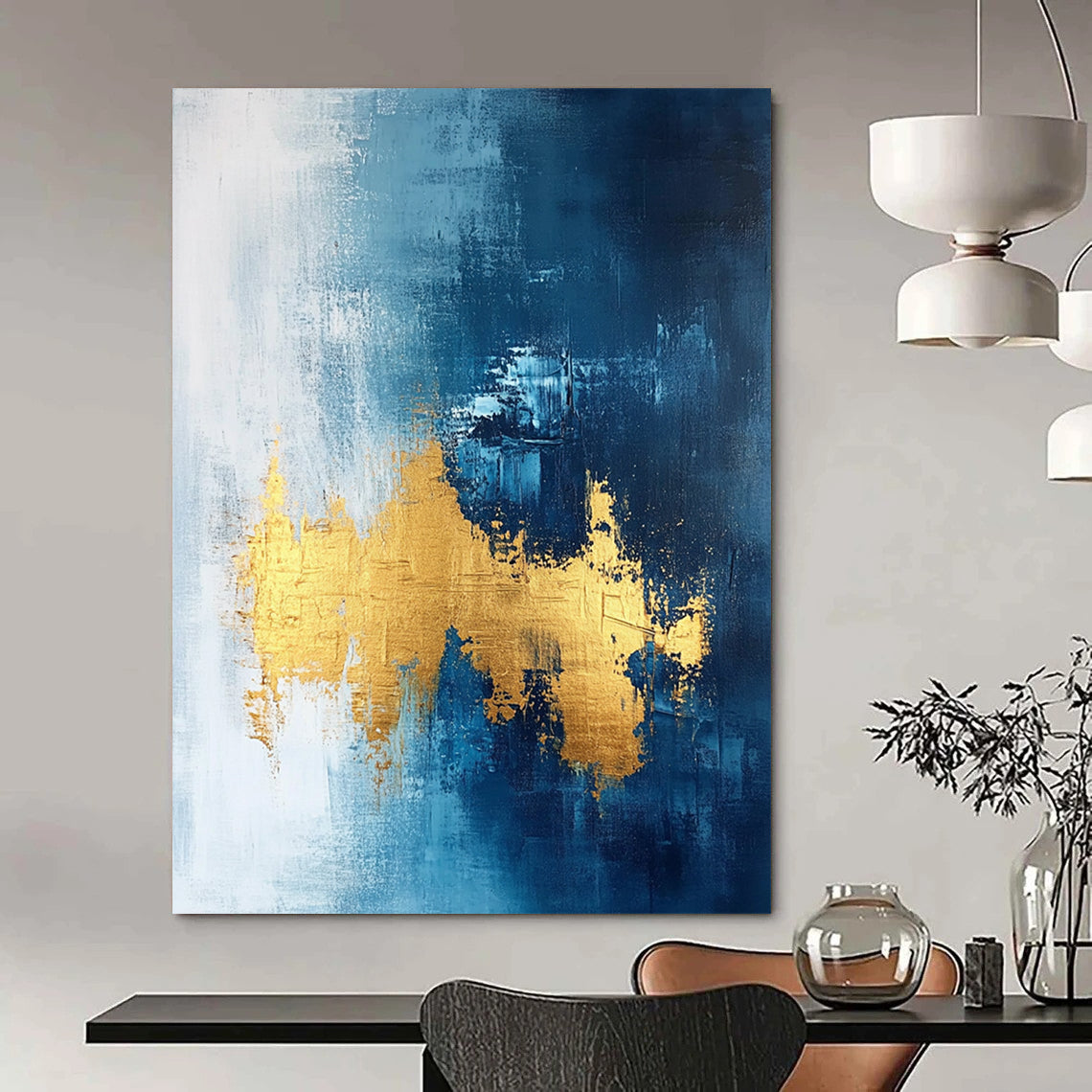 Contemporary abstract painting features gold leafing on a dark blue white and light gray background with elegant brush strokes and a sophisticated texture. DLZ0334