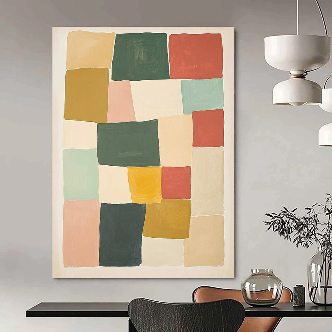 Contemporary hand-painted abstract artwork features geometric blocks in shades of green red and yellow against a beige background creating a harmonious composition. DLZ1596