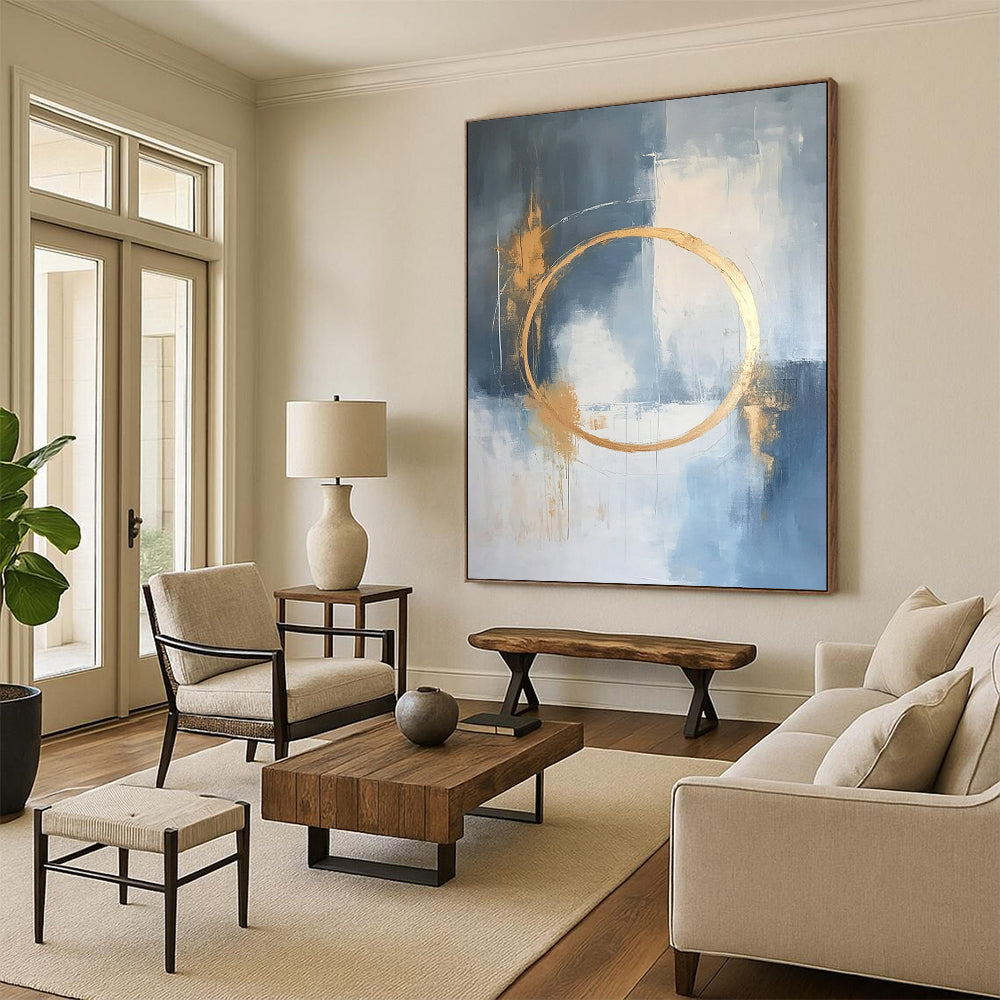 Large contemporary abstract painting features a light blue and white background with gold accents and elegant lines for a high-end aesthetic. DLZ0545