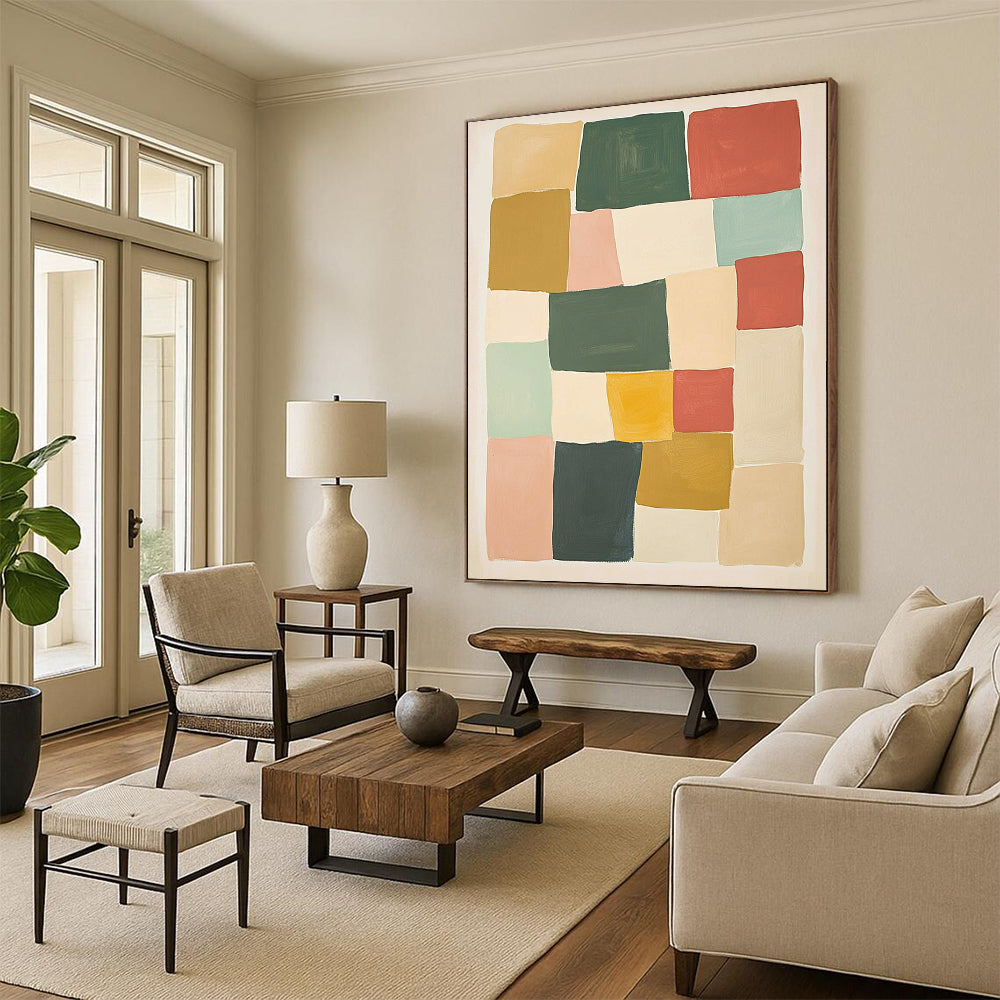 Contemporary hand-painted abstract artwork features geometric blocks in shades of green red and yellow against a beige background creating a harmonious composition. DLZ1596