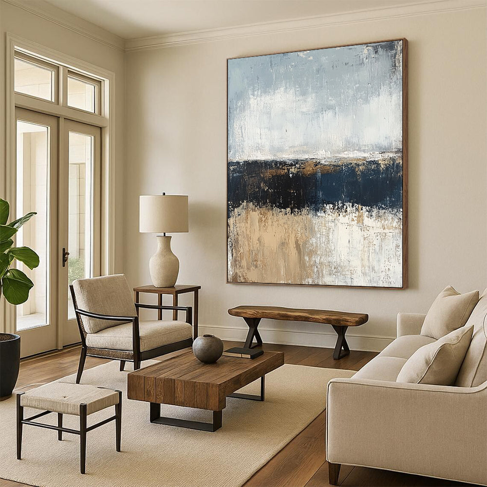 Contemporary hand-painted abstract artwork featuring a serene ocean shore in muted gray and blue tones with a neutral palette of beige and brown in oil paint. DLZ0955