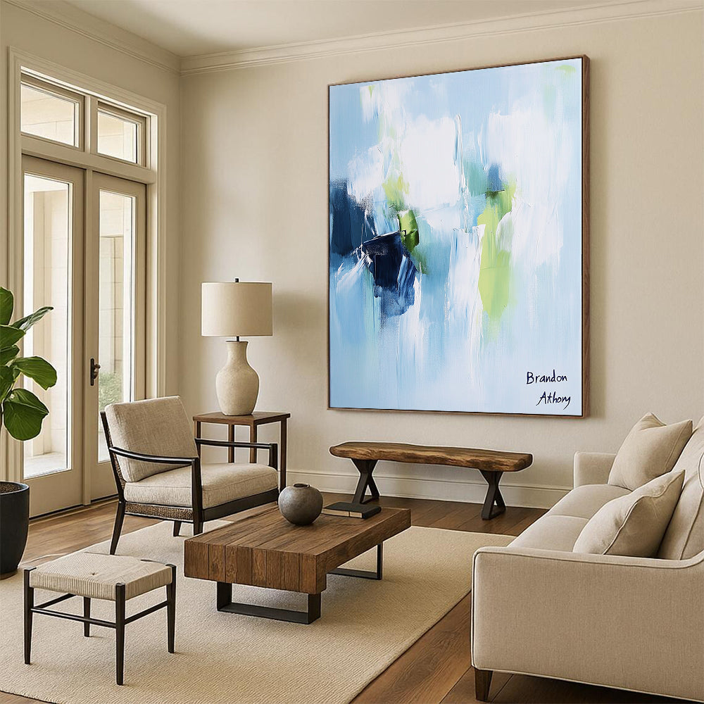 Contemporary hand-painted abstract artwork in light blue, white, and green tones creates a serene and peaceful atmosphere with elegant brush strokes. DLZ1045