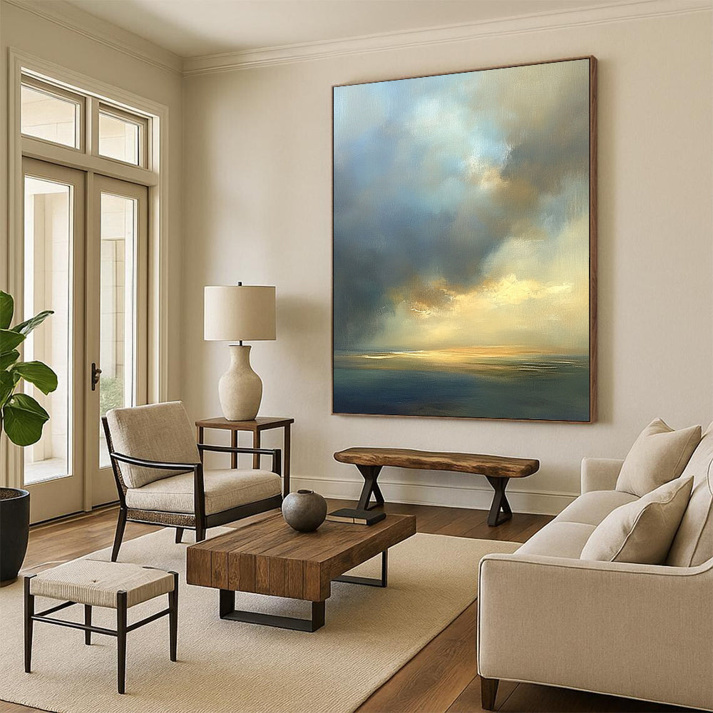 Contemporary abstract oil painting featuring an expansive sky in muted beige and blue tones with soft edges and atmospheric clouds. DLZ0888