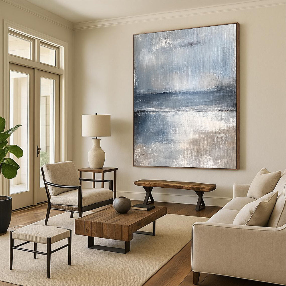 Large contemporary hand-painted abstract artwork featuring serene coastal landscape in muted tones of pale blue and gray evoking a calming sea breeze. DLZ0373