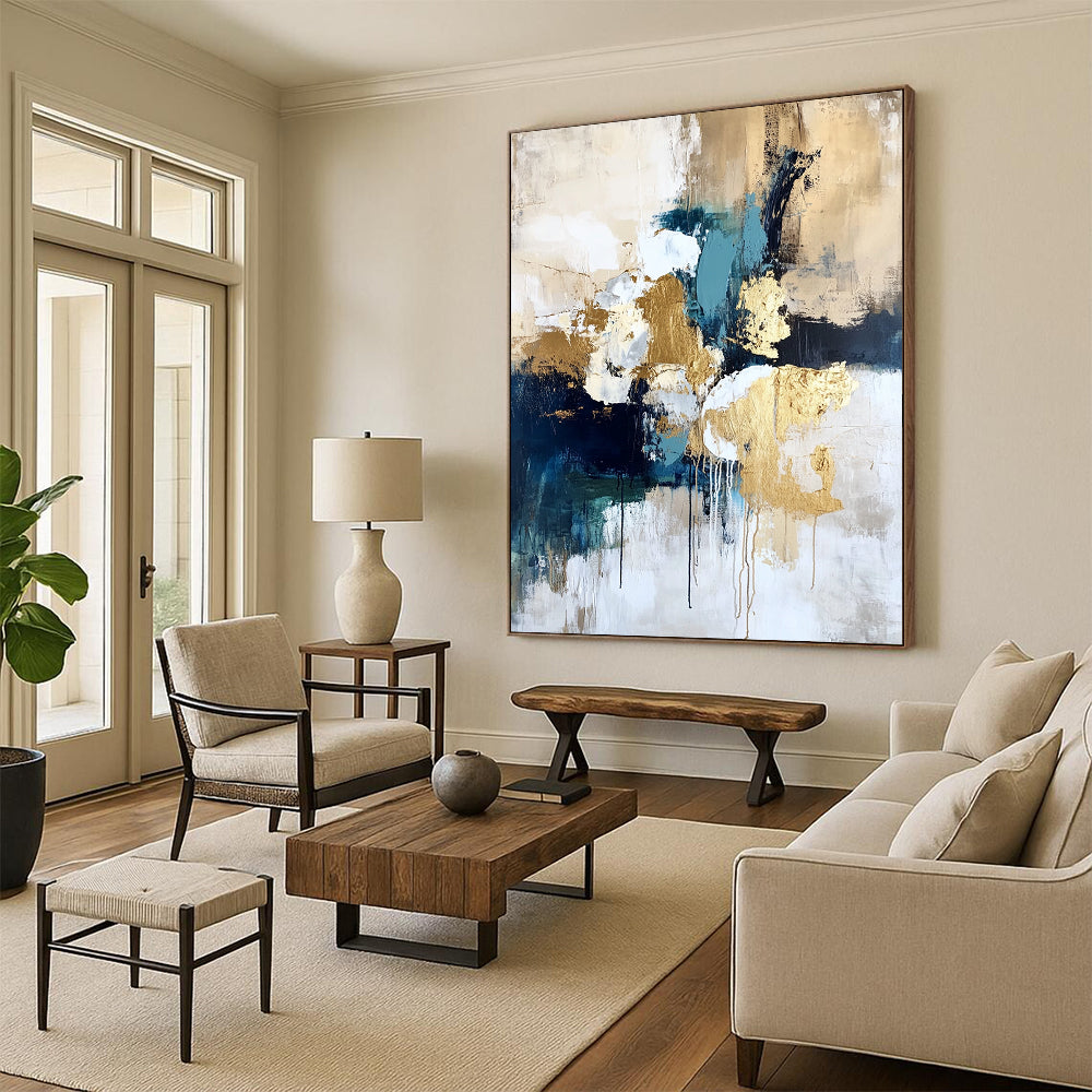 Contemporary hand-painted abstract art on textured canvas with gold foil highlights in cream white and blue creating a romantic atmosphere with vibrant earthy tones. DLZ1009