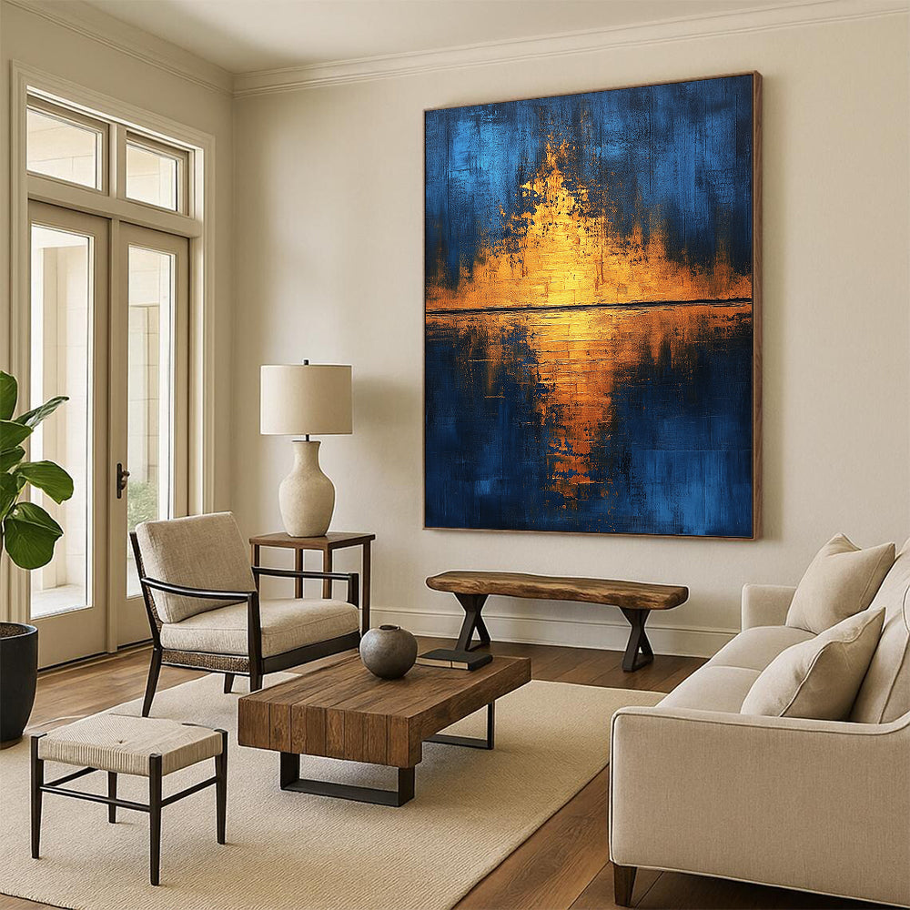 Contemporary hand-painted abstract art featuring golden light reflections on water with blue and gold hues enhanced by gold foil and textured canvas. DLZ0506