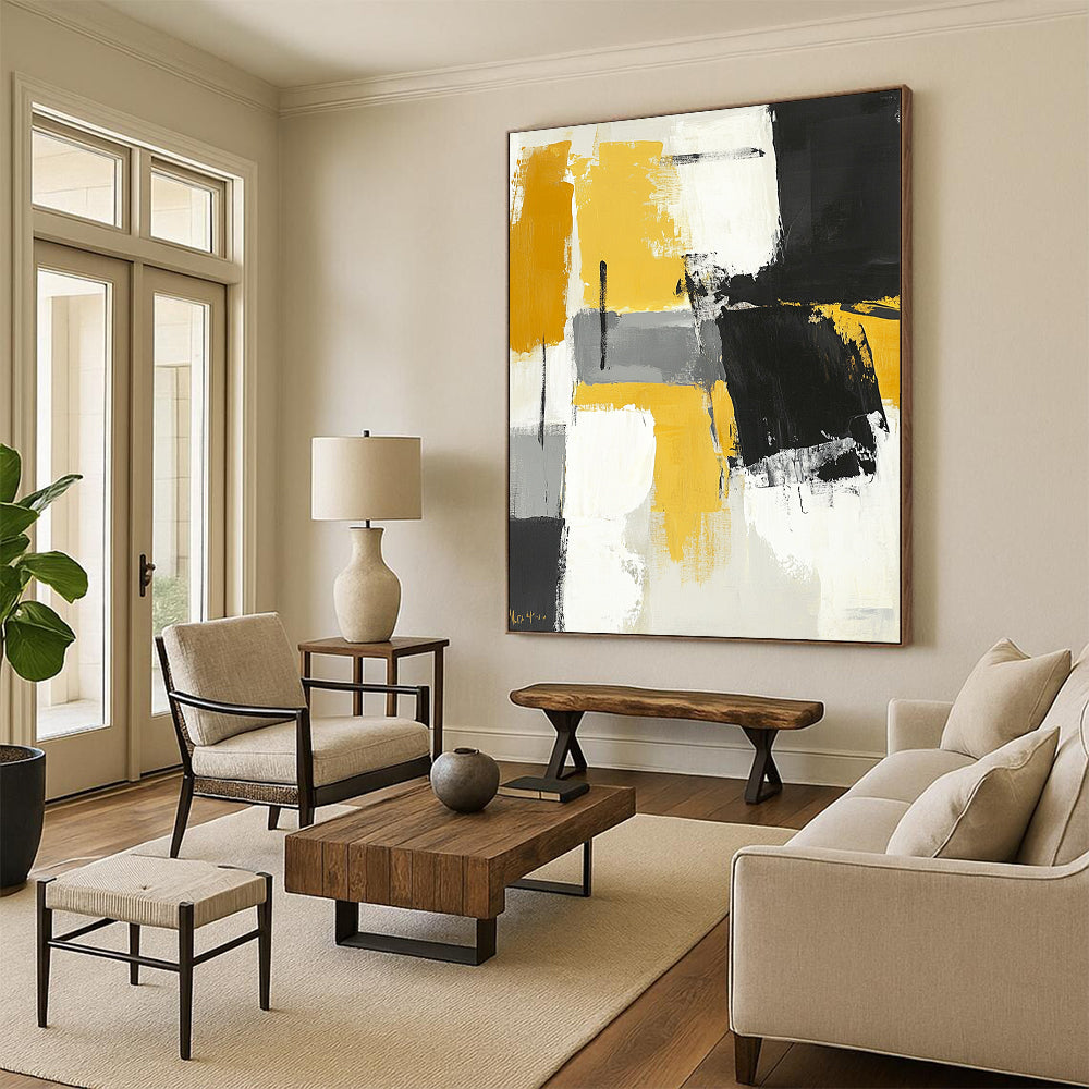 Contemporary hand-painted abstract art featuring black gray and yellow color blocks with brushstrokes on a neutral toned white background. DLZ0731