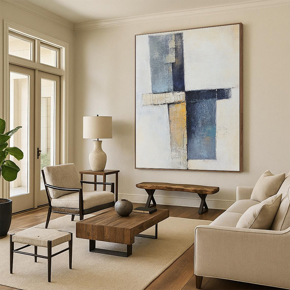 Contemporary abstract artwork showcasing a cross with soft shapes in earthy tones and blue-gray, featuring a vertical line and scattered blocks. DLZ0969