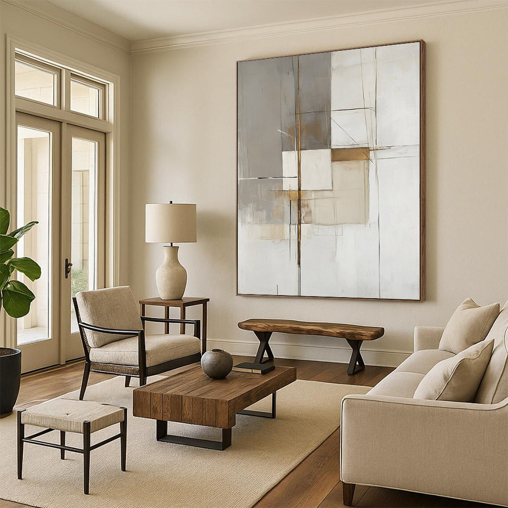 Large contemporary hand-painted abstract artwork features white gray and beige organic shapes with gold accents and heavy brushwork on a minimalist background. DLZ1742