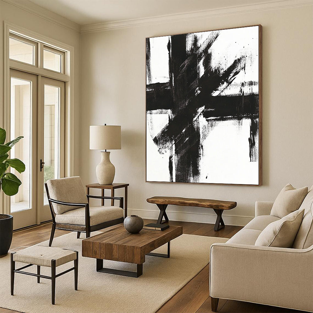 Contemporary abstract painting features a bold black and white cross with striking brush strokes on a bright canvas. DLZ0271