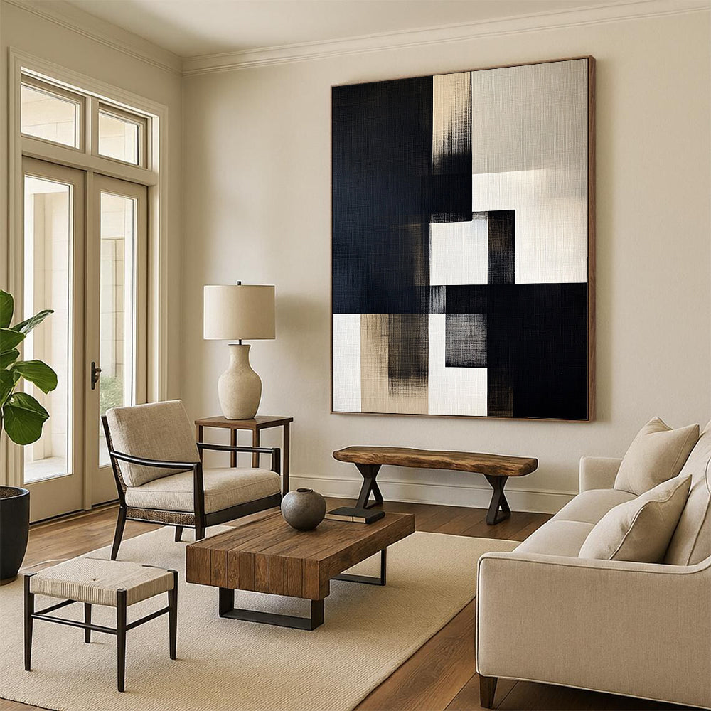 Contemporary hand-painted abstract artwork featuring black, white, and gray geometric shapes on off-white linen with illuminated highlights. DLZ1307