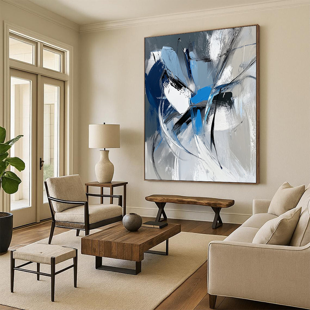 Large contemporary hand-painted abstract art featuring dynamic white gray and blue shapes with bold brushstrokes and a vibrant urban energy. DLZ1008