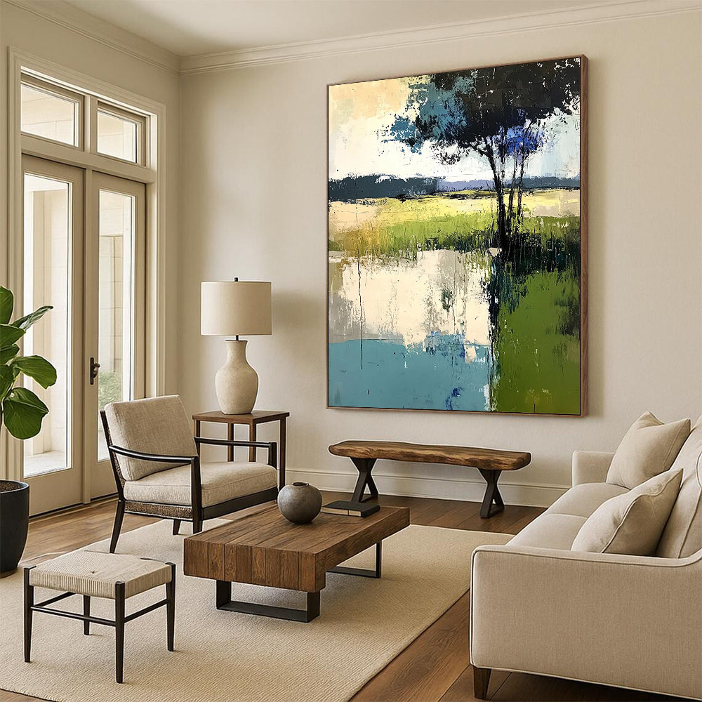 Contemporary abstract painting featuring soft edges trees and grass in muted greens blues and grays created with thick brush strokes and palette knife techniques. DLZ0419