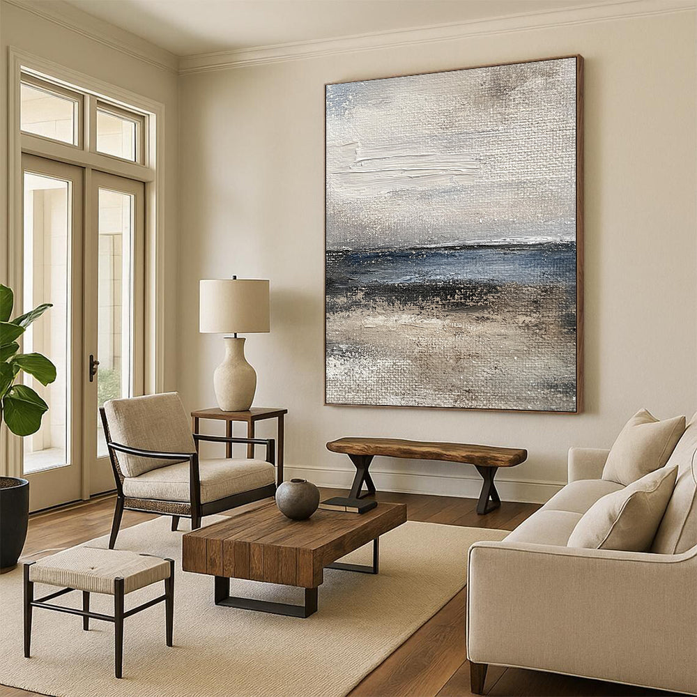 Contemporary abstract painting captures the ocean's essence with textured brushstrokes in muted gray and blue tones for a vintage feel. DLZ1077