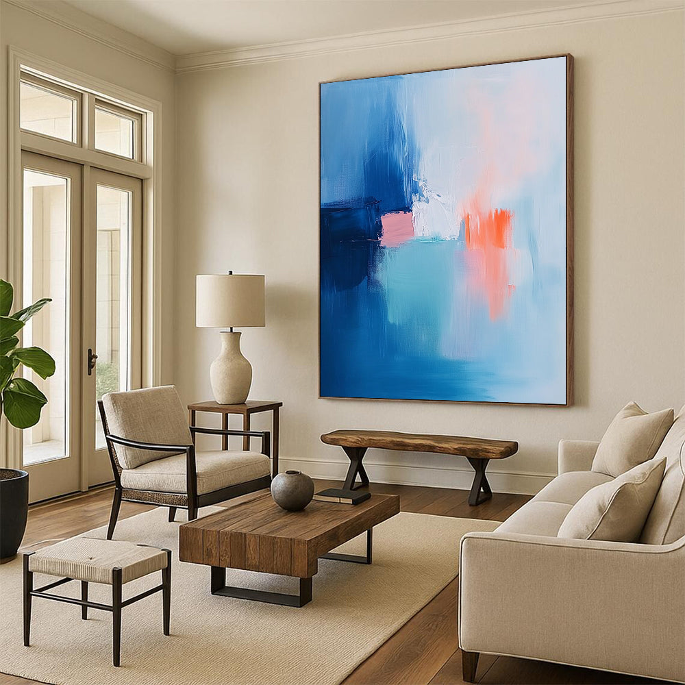 Contemporary hand-painted abstract art featuring soft brush strokes in light blue pink and white with navy blue and orange accents. DLZ1053