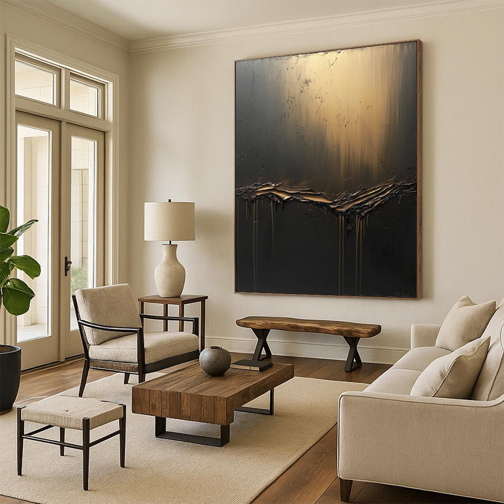Large contemporary hand-painted abstract artwork features textured dark gray canvas with golden light and flowing black fluid, accented by ethereal shapes. DLZ0691