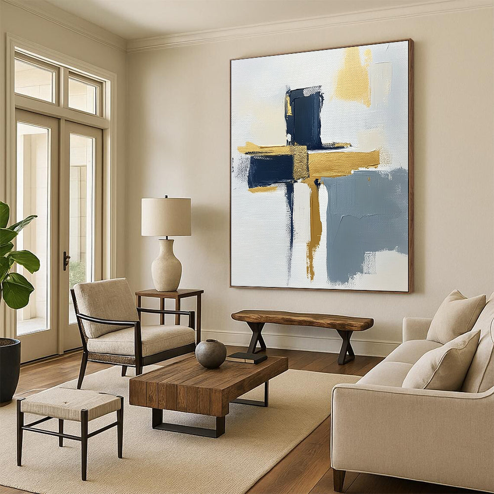 Contemporary hand-painted abstract art featuring a minimalist cross design on a textured canvas with gold highlights navy blue and gray accents. DLZ0592