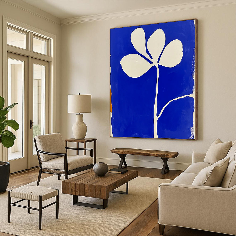 Large contemporary abstract painting featuring blue and white minimalist flower shapes in the style of Matisse with block print aesthetics. DLZ1154