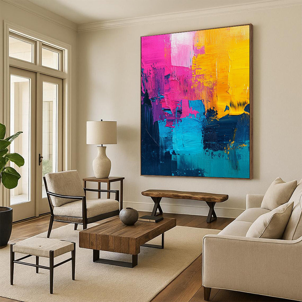 Vibrant contemporary abstract painting with bold pink and yellow accents, a striking turquoise center, and rich dark blue features, showcasing textured acrylic brush strokes. DLZ0776