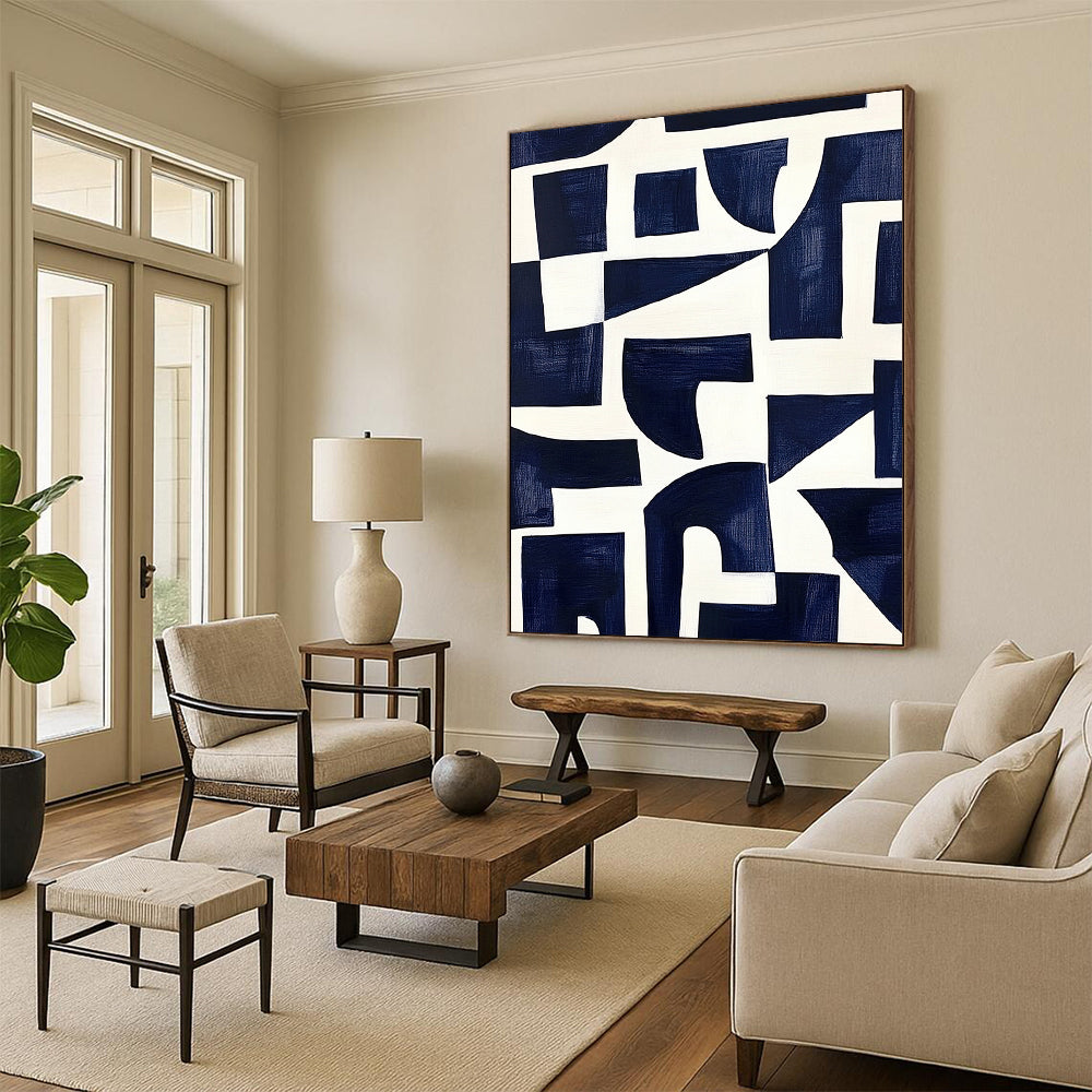 Contemporary hand-painted abstract art features navy blue shapes on a white background inspired by Matisse's cutouts with dark indigo and off-white accents. DLZ1430