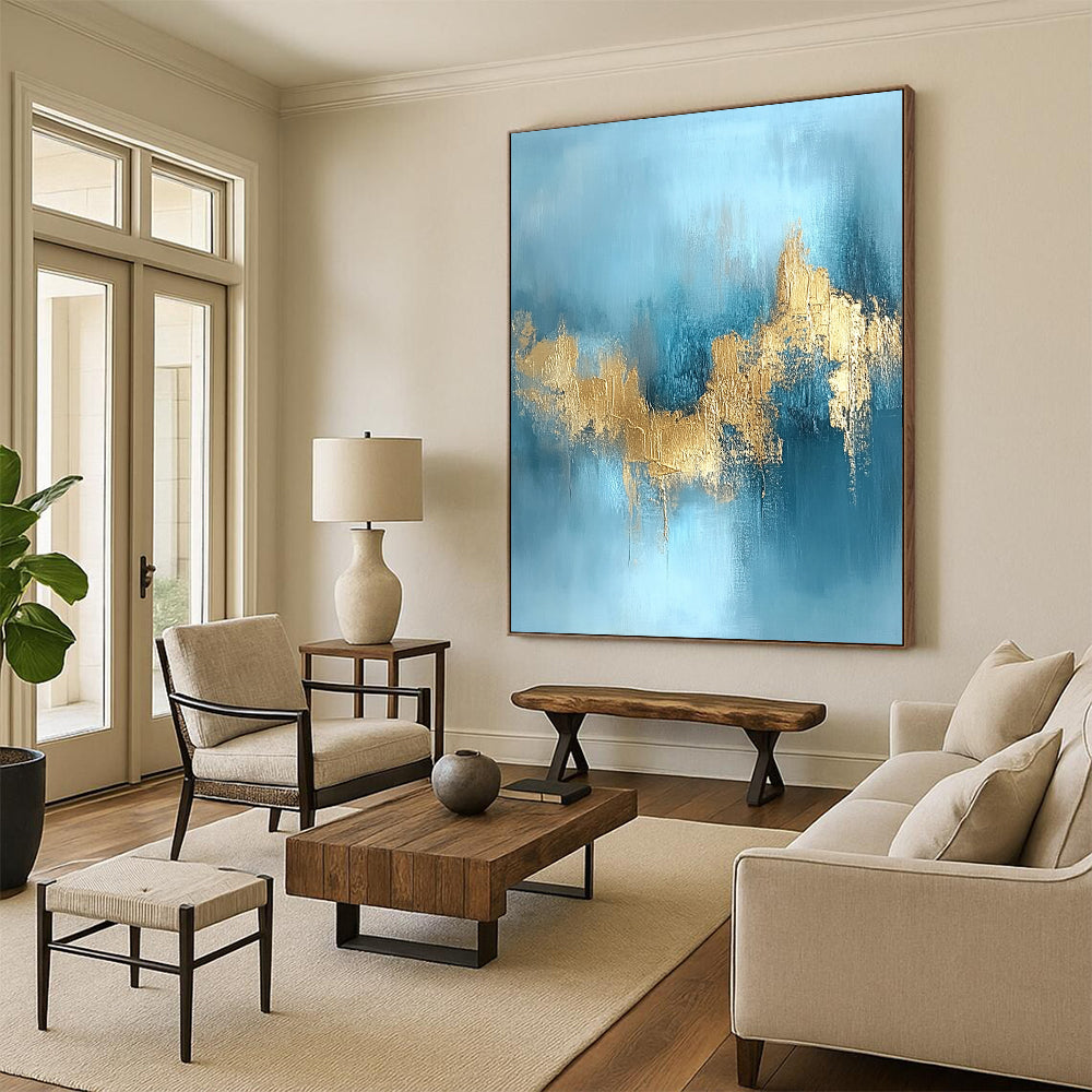 Contemporary hand-painted abstract art featuring a serene water and sky blue backdrop adorned with stunning gold foil textures. DLZ0723