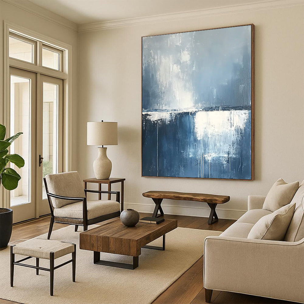 Contemporary hand-painted abstract art featuring misty clouds and rain over the ocean in soothing blue and grey tones with soft white edges. DLZ0630
