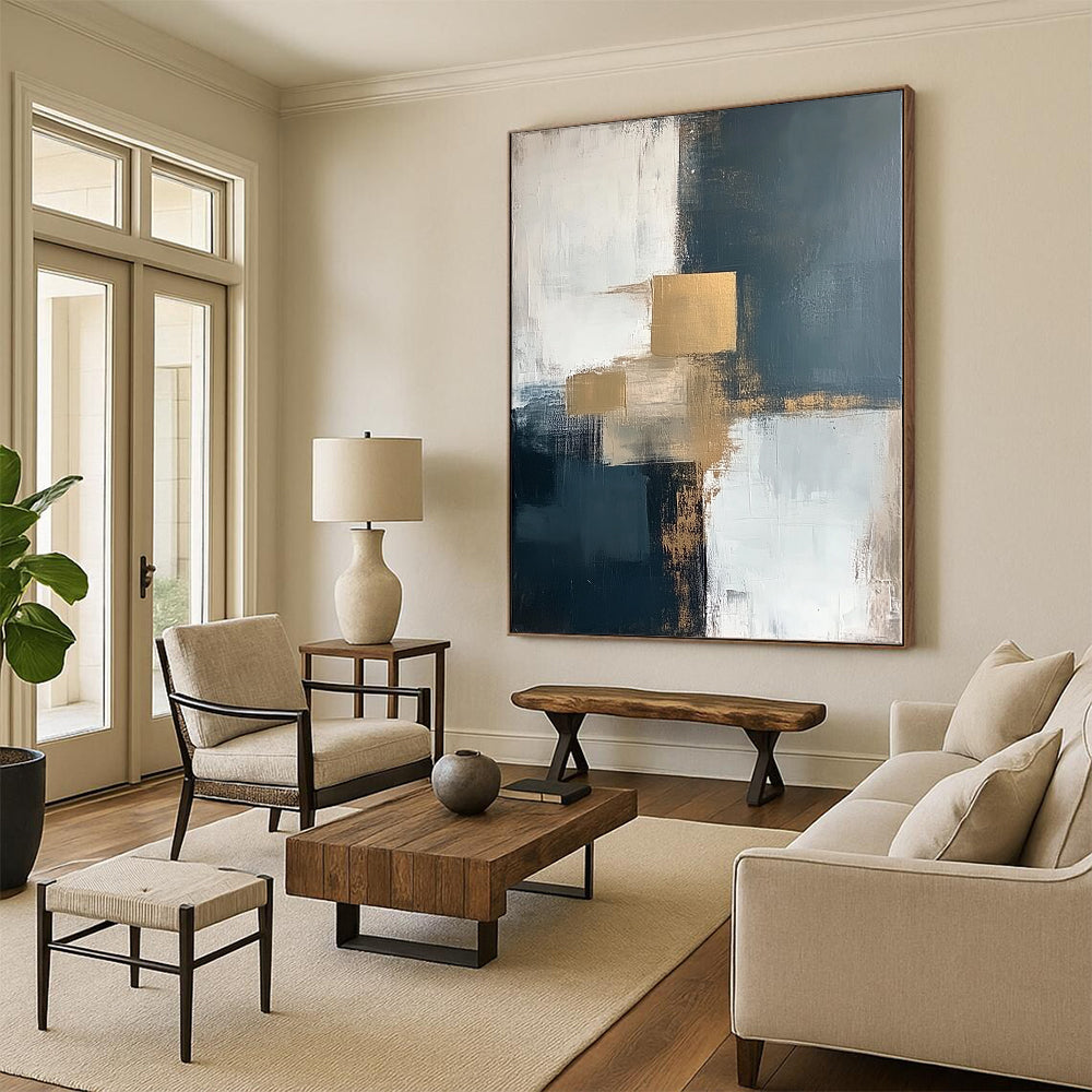 Contemporary abstract artwork featuring bold brush strokes in white, grey, beige, and blue with striking gold accents for a vibrant decor statement. DLZ0344