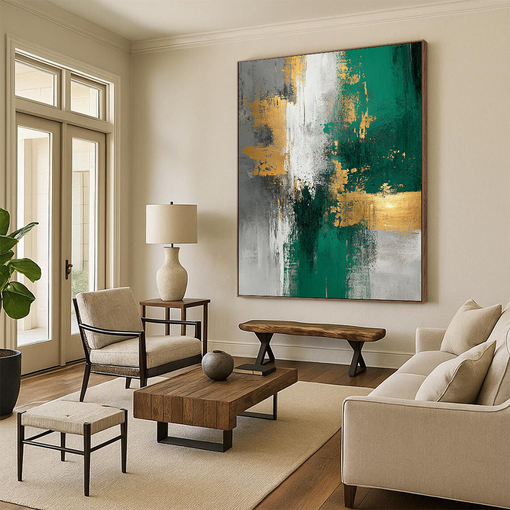 Large contemporary abstract painting featuring gold foil texture emerald green and white tones on light gray background with elegant composition and soft lighting. DLZ0273