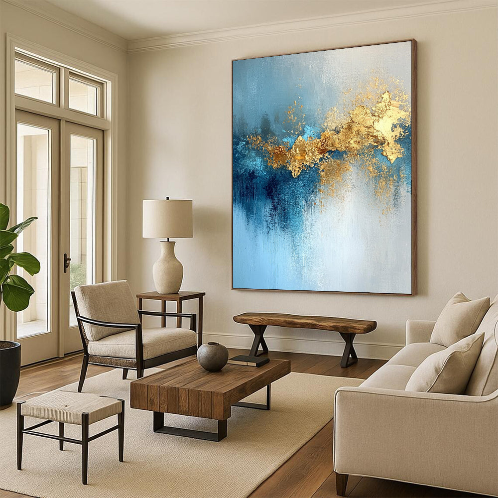 Contemporary hand-painted abstract artwork featuring gold leaf, soft light, blue tones, atmospheric clouds, and a mysterious shimmering texture. DLZ0336