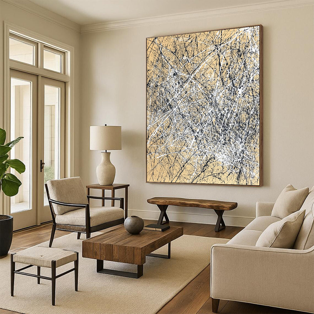 Contemporary hand-painted abstract artwork features dynamic brush strokes and expressive composition in white and black against a light brown background. DLZ1162