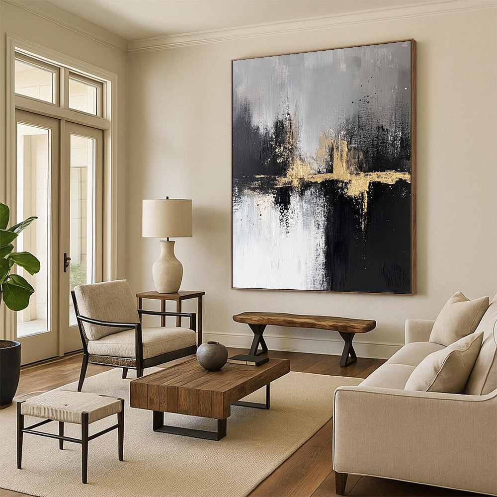 Contemporary abstract artwork featuring textured black and white brush strokes with gold accents capturing a serene cityscape atmosphere in neutral tones. DLZ0317
