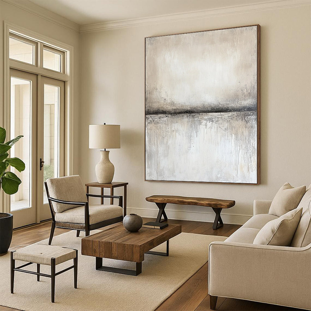 Contemporary abstract artwork features textured canvas in neutral gray and beige, with soft gradients and a central empty space showcasing subtle movement and light. DLZ0877