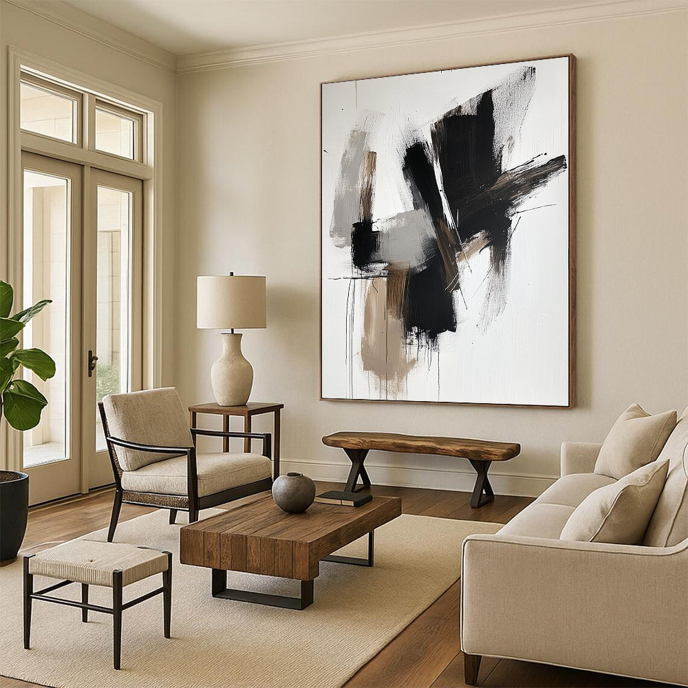 Contemporary hand-painted abstract artwork features bold black shapes with brown tones and white accents on a sleek neutral backdrop. DLZ0316