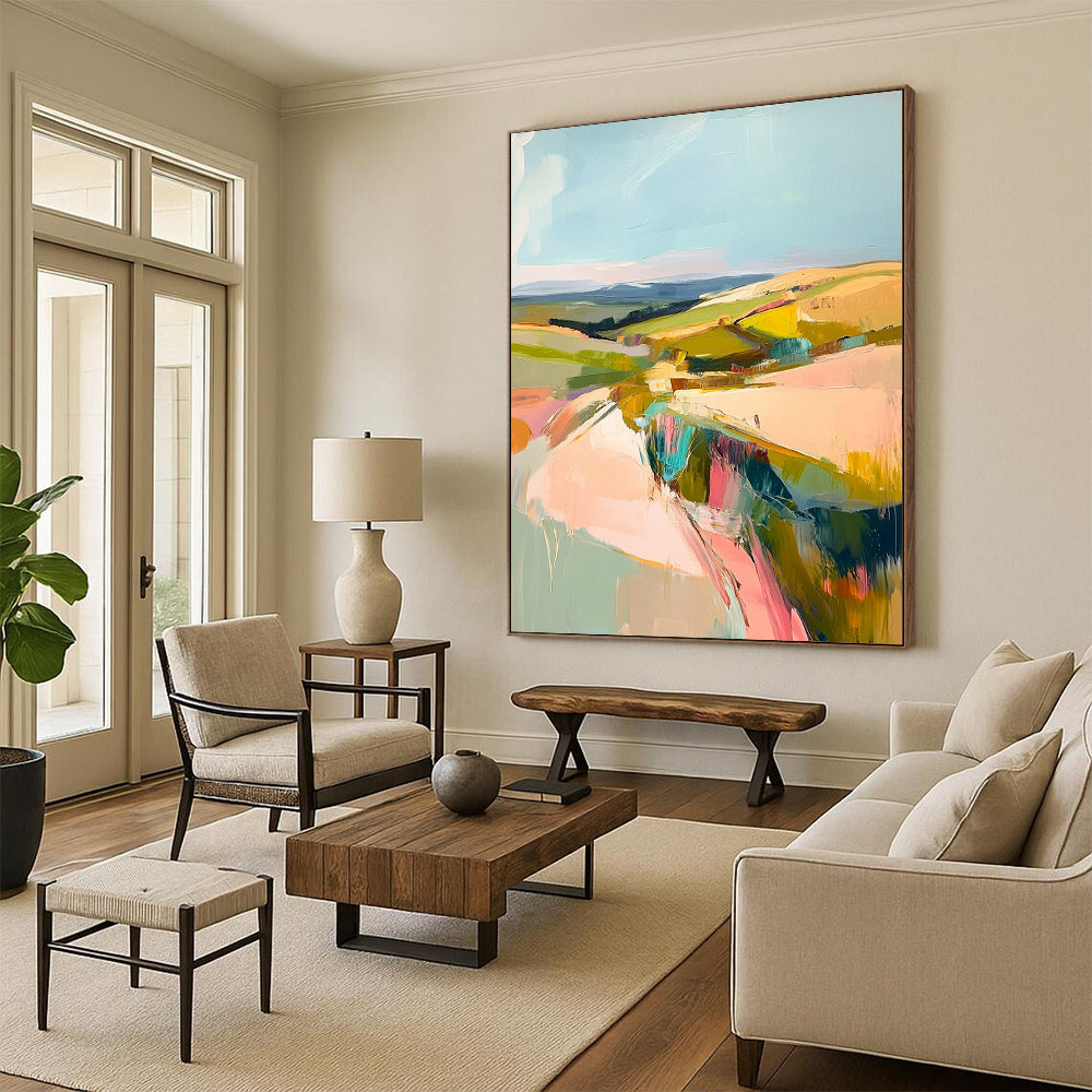 Large contemporary abstract painting featuring a pastel palette of pinks greens and yellows capturing the beauty of Welsh rolling hills and blue skies. DLZ1003