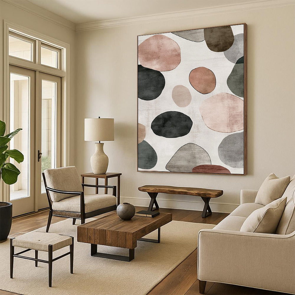 Contemporary hand-painted abstract artwork features a serene design of overlapping circles and pebbles in shades of gray with brown green and pink accents. DLZ1646