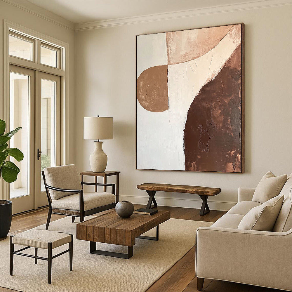 Contemporary abstract artwork featuring organic shapes in brown and white with soft edges and minimalist design, emphasizing fluid lines and canvas texture. DLZ0997