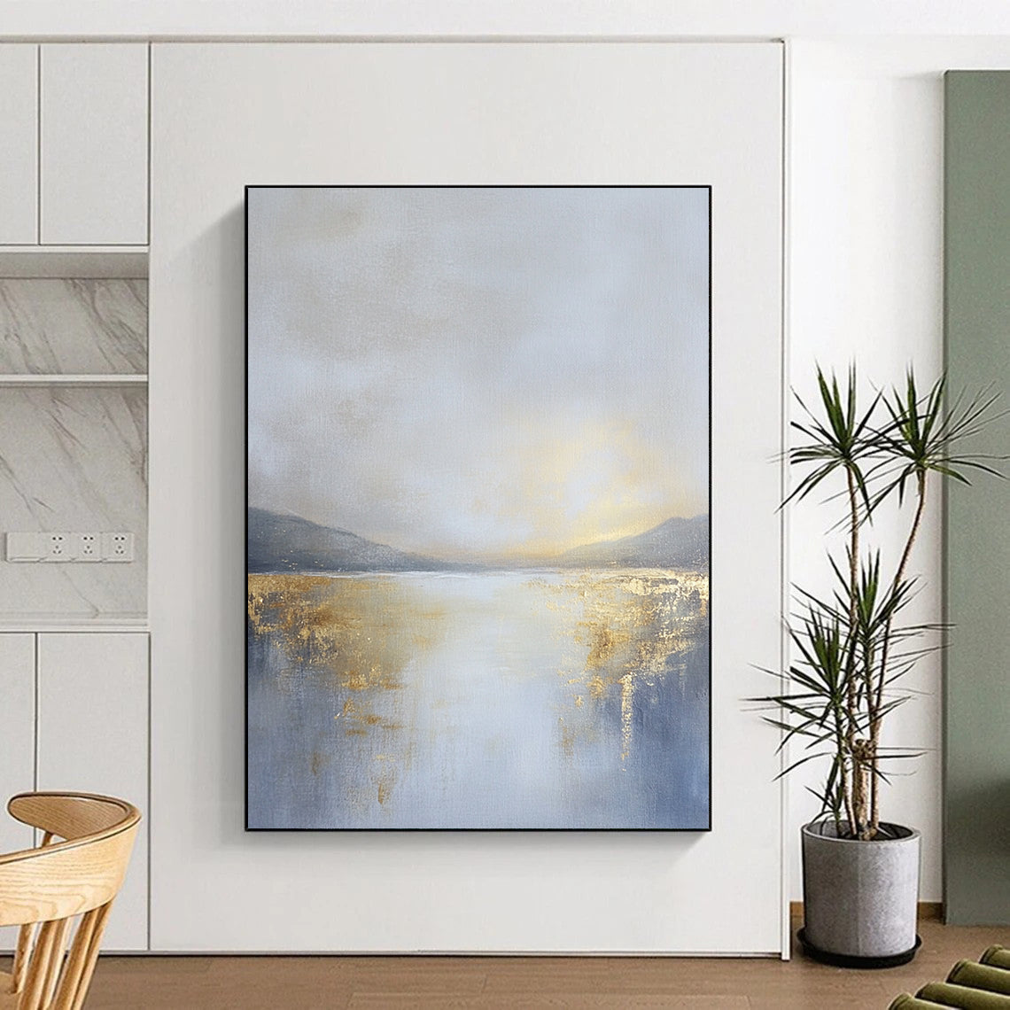 Contemporary abstract painting featuring an overcast sky in gold and grey tones with a tranquil lake in the distance, creating a serene atmosphere. DLZ0585