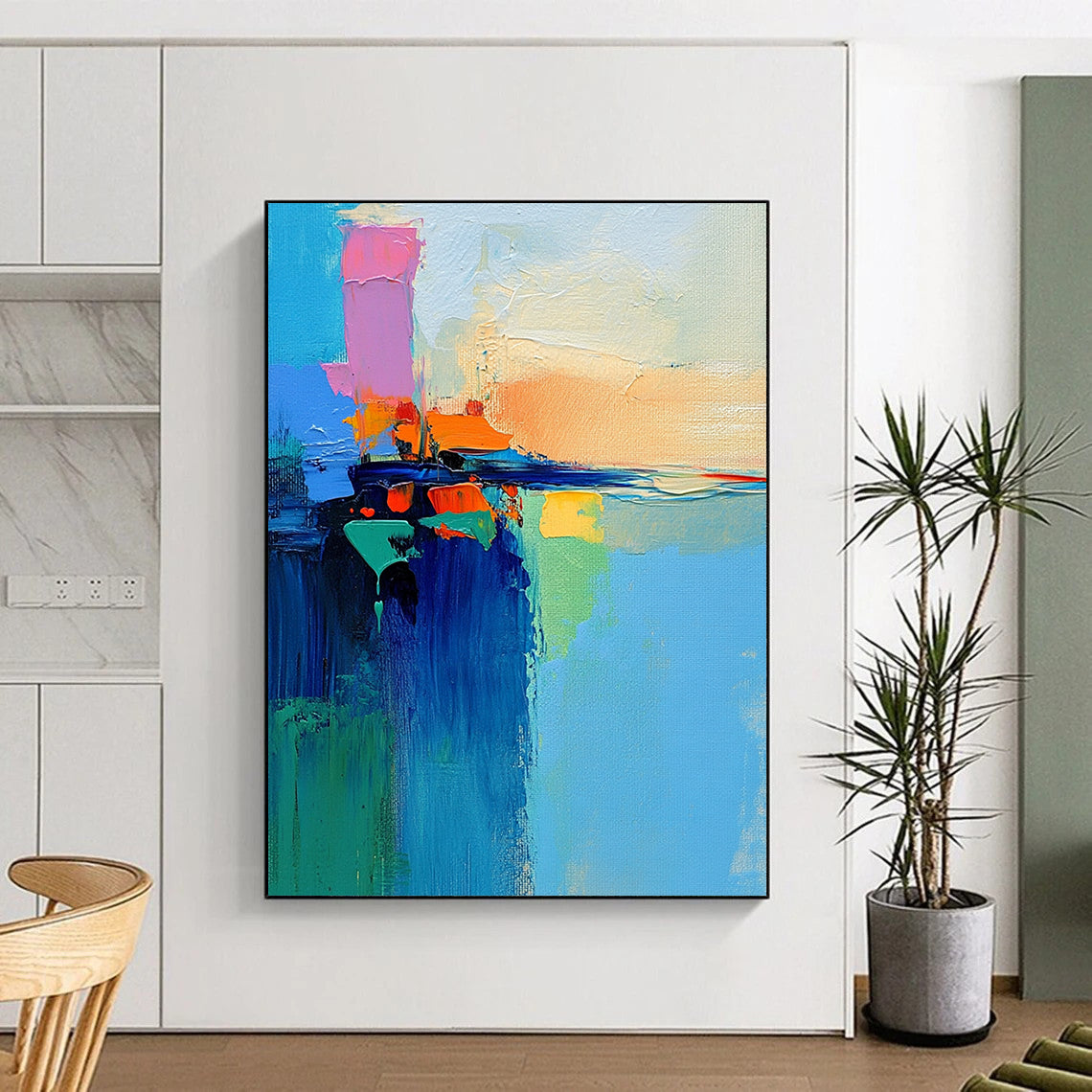 Contemporary abstract art featuring a vibrant lake and sky painted with a palette knife in dynamic brush strokes of blue green orange pink and yellow. DLZ0469