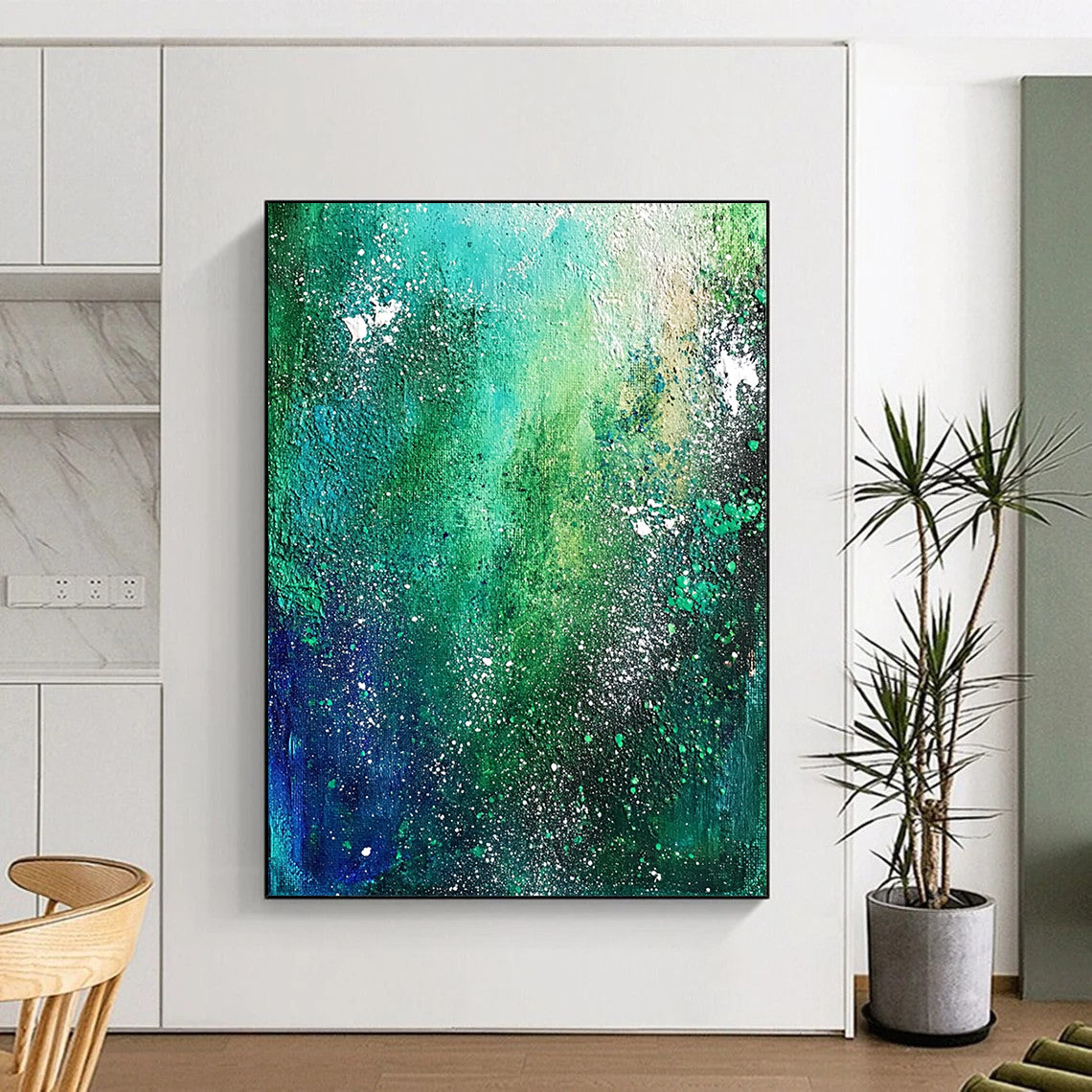 Contemporary hand-painted abstract artwork featuring emerald green and blue, depicting the Milky Way with textured white star speckles and dark teal foliage. DLZ0347