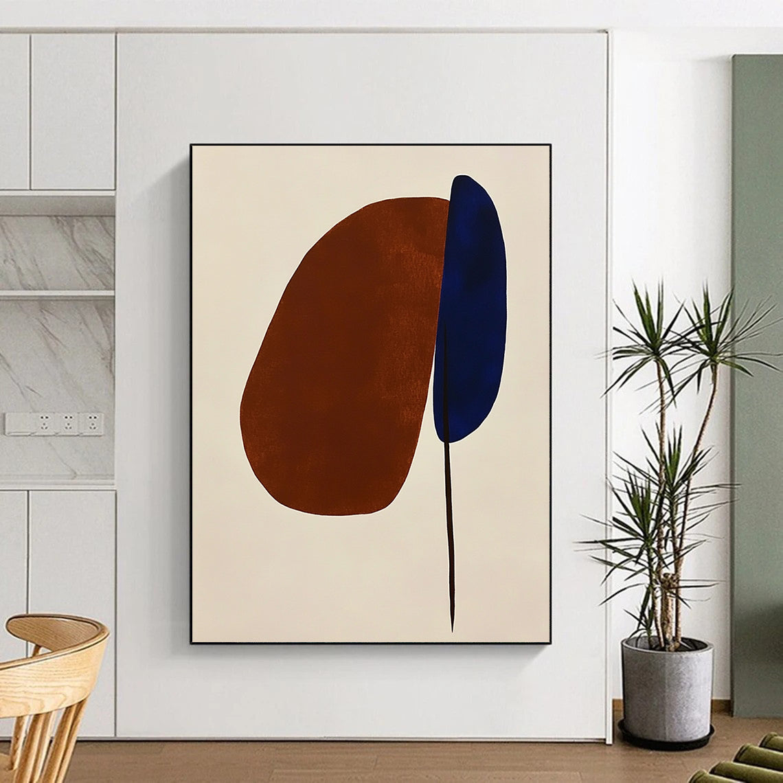 Contemporary hand-painted abstract art featuring simple brown and blue shapes on white, highlighting an oval and a space-inspired petal in a minimalist style. DLZ1310