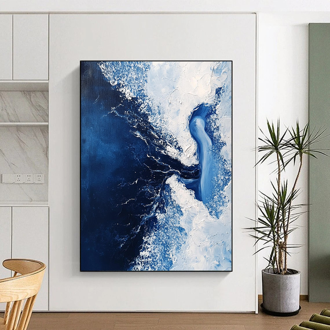 Contemporary abstract painting features a dark blue sea with white foam and an ice woman submerged within flowing water in minimalist style. DLZ0649