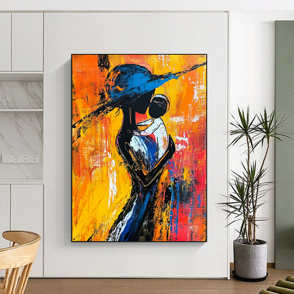 Contemporary abstract painting showcasing a woman in black and white with a blue hat surrounded by warm reds yellows and oranges vibrant brush strokes. DLZ1499