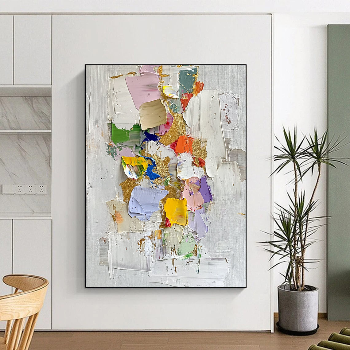 Contemporary abstract oil painting features gold leaf accents thick textures and vibrant colors on a white background with scattered colored paper pieces. DLZ0451