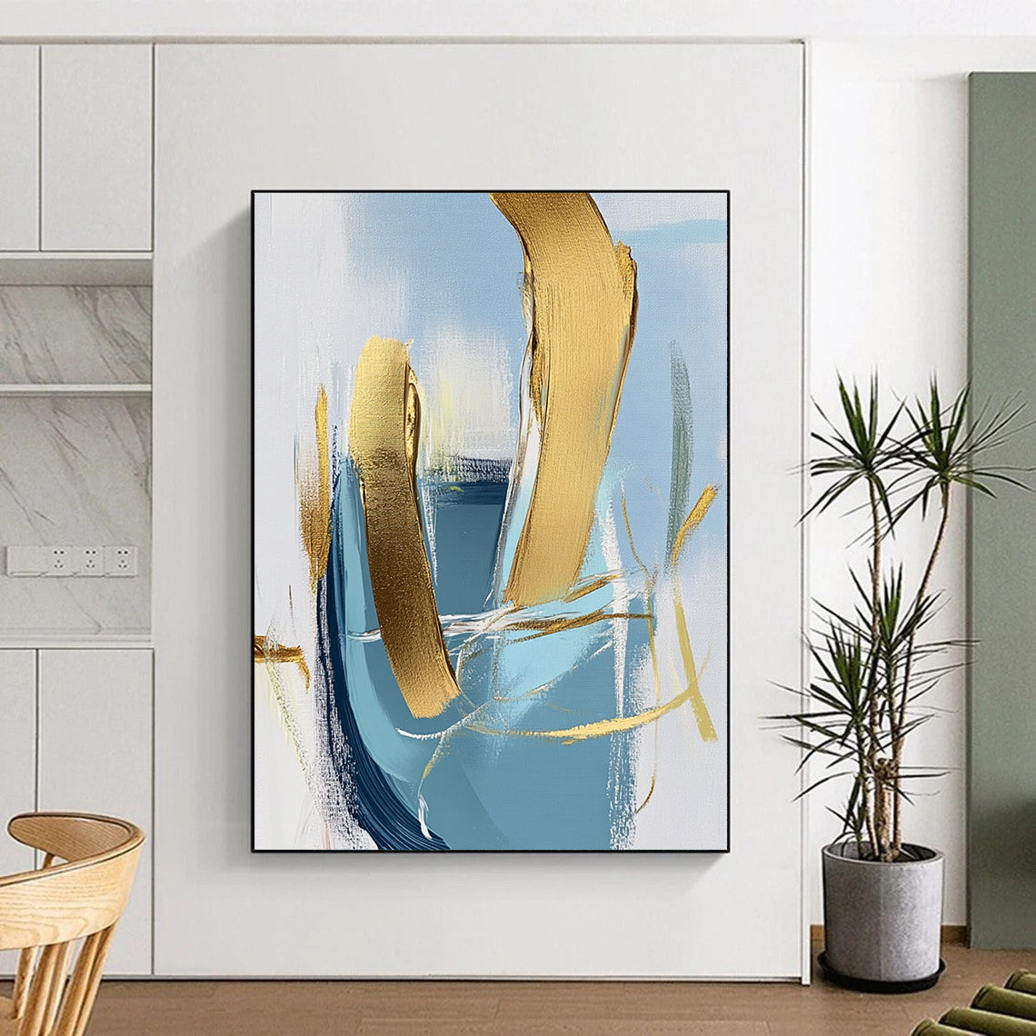 Contemporary hand-painted abstract art featuring a close-up of an armchair with gold foil accents on a light blue and white background. DLZ0573